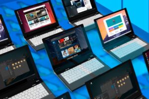 Several laptops side by side with different linux distributions 1024x576 1